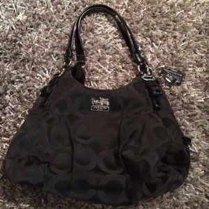 The "Maggie" coach black bag