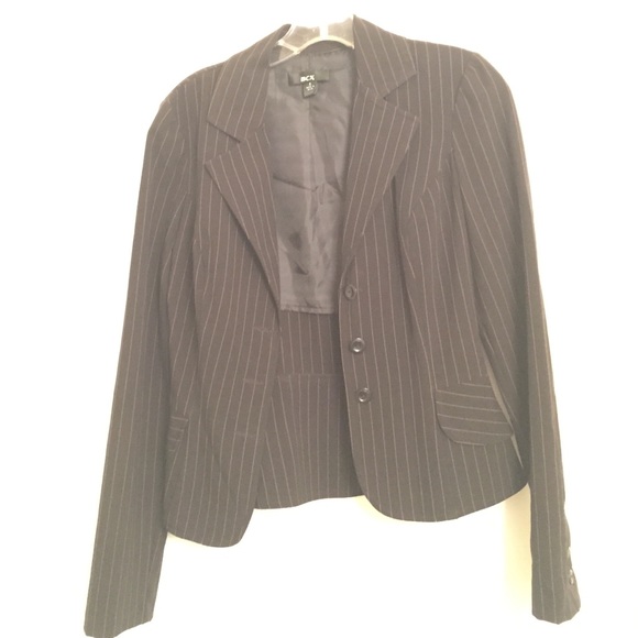 Black blazer with pink stripes.