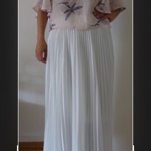Pleated white maxi skirt