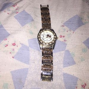 Hello kitty gold watch.