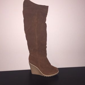 Tall tan wedge boots