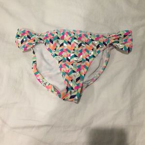 PINK  bathing suit bottoms.