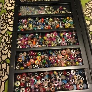 Charm bracelet brads and charms in all designs.