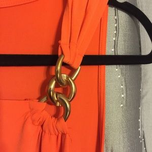 Beautiful orange Jennifer Lopez dress w/ gold hook
