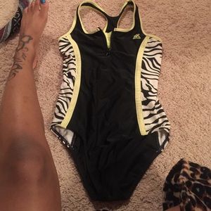 Kids size 14. It has been used.