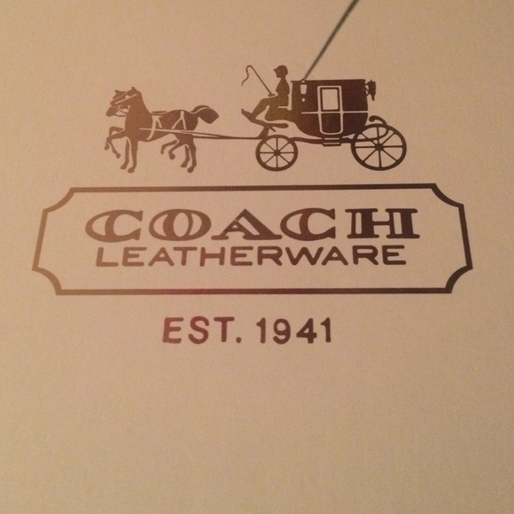 Authentic Coach rain boots with a 3in heel