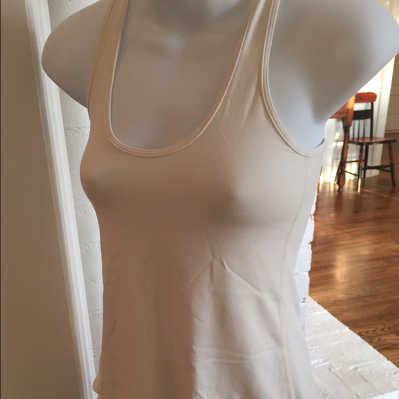 Cream colored ruffled Lulu top.  Size 4.