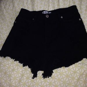 High waisted distressed black shorts
