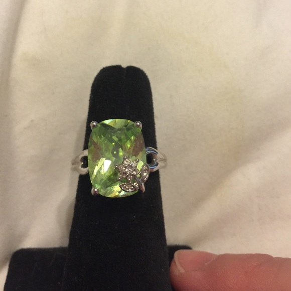 Adjustable green stone Avon ring