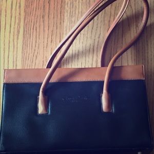 Cleo $ Patek Genuine Leather Handbag.