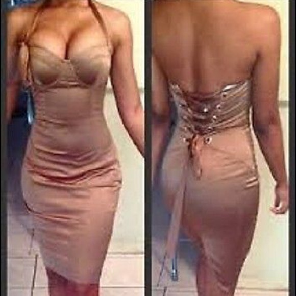 "Sold. " George Marciano lace up corset sheath