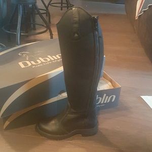 Never worn. Tall black riding boots