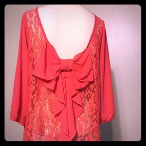 Back bow detail coral lace top. Size: medium