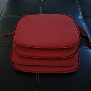 Set of 4 red chair cushions