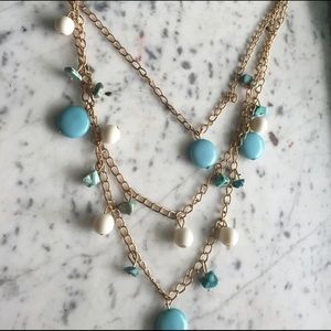 Blue and white with gold chain necklace Blue and white with gold chain necklace