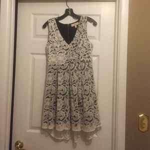 Ivory lace dress with black underneath