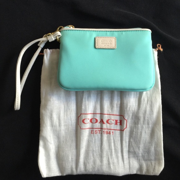 Coach Wristlet Aqua Blue with dust bag.