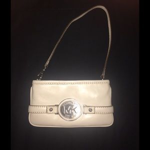 Small off white MK clutch