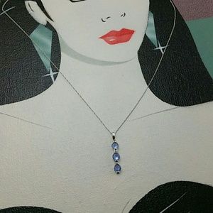 Tanzanite & diamond pendant 14k white gold