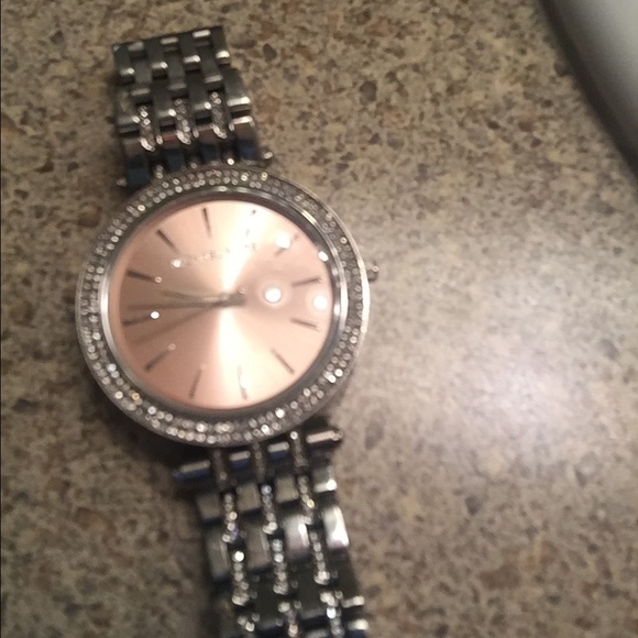 MK watch 100% authentic says Michael kors inside