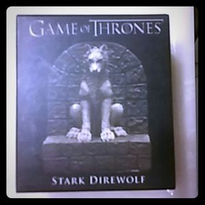 3 inch stark direwolf statue and 48 page book