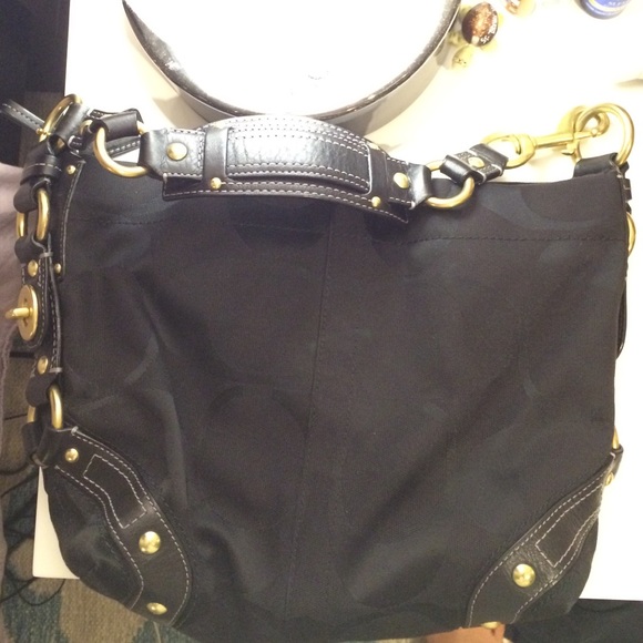Black coach handbag with gold hardware