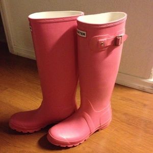 Hunter raspberry rain boots.
