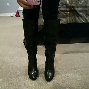 Black leather knee high boots
