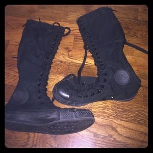 Knee high black chuck Taylor converse