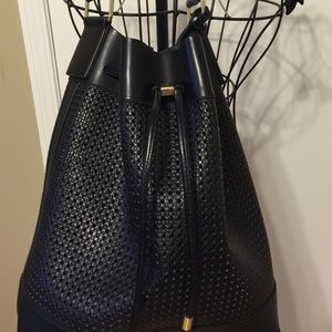 Vince Camuto perforated leather bucket bag