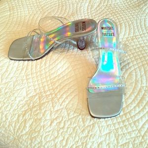 "Clear" and silver heels