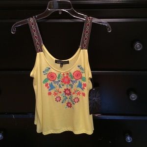Bright yellow Almost Famous tank top