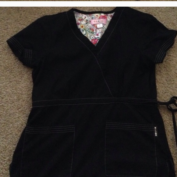 Black top, 5 pants, and elephant top at $15 each