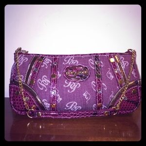 Baby Phat logo clutch purse.