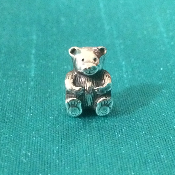 Authentic Pandora teddy bear charm.