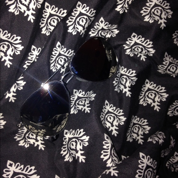 aviator style sliver smoked sunglasses.