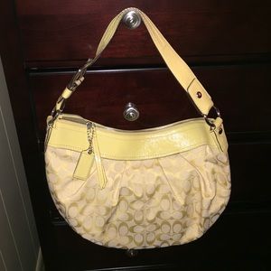 A yellow Coach bag in mint condition!