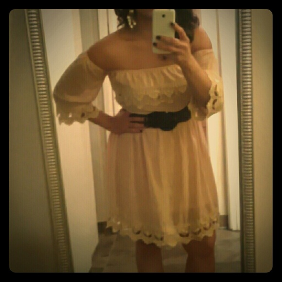 A baby pink lace trimmed dress for any occasion.