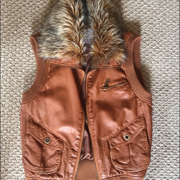 Never worn leather vest with fur collar