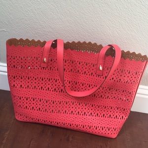 Pink Stella and Dot tote with zipper pouch inside