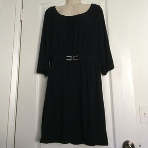 Little black dress  with accent belt.