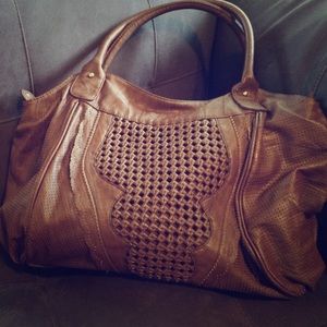 Tan hobo bag.