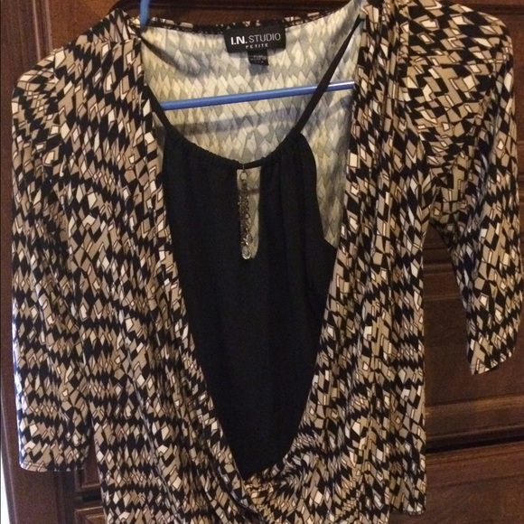 Beautiful key hole blouse.  Very flattering.