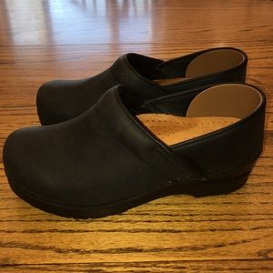 Dansko/Sanita black oil rubbed clogs.
