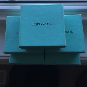 Five empty Tiffany & Co boxes