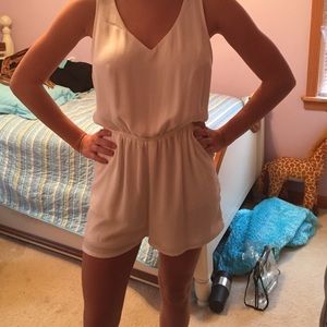 White romper with open back