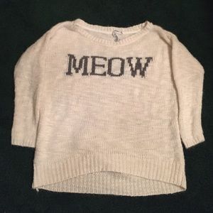 Adorable sweater that's says meow
