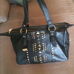 Black and gold Steve Madden purse
