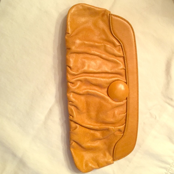 Yellow leather HOBO International clutch