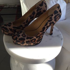 Calf skin leopard hidden platform shoes.